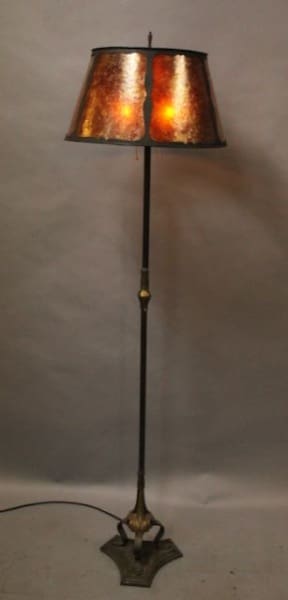 Vintage floor lamp with copper lampshade.