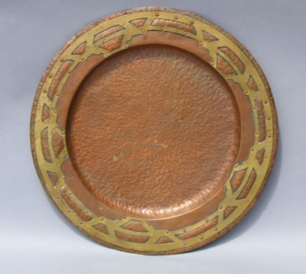 Antique brass and copper decorative plate.