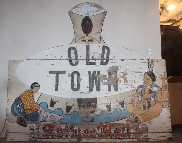 Weathered Old Town Antique Mall sign.