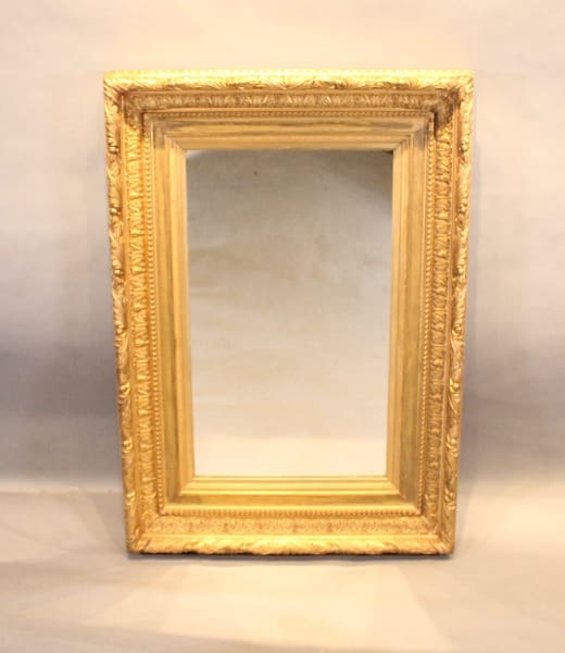 Ornate gold rectangular picture frame.
