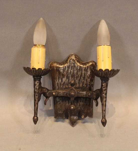 Vintage double candle wall sconce fixture.