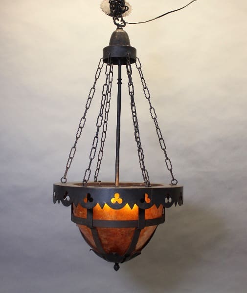 Ornate metal and glass hanging chandelier.