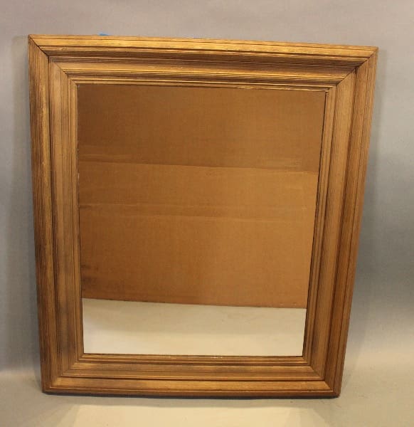 Wooden framed rectangular wall mirror.