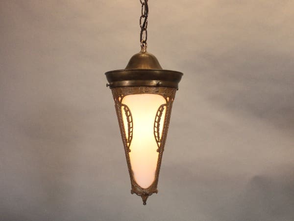 Antique hanging lantern with warm glow.