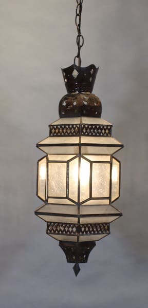 Hanging ornate lantern with geometric design.
