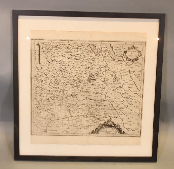Framed vintage map with detailed regions.