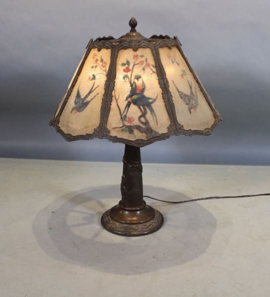 Vintage lamp with bird-themed lampshade.