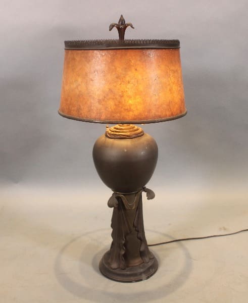Vintage table lamp with brown shade.