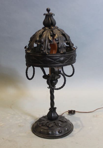 Ornate wrought iron decorative table lamp.