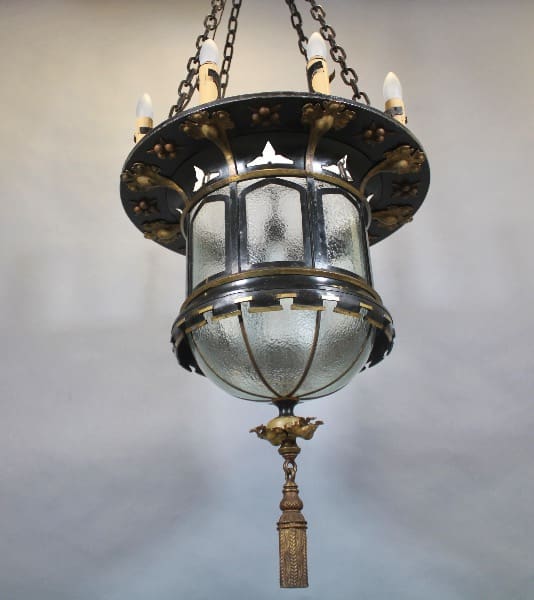Vintage hanging lantern with ornate design.