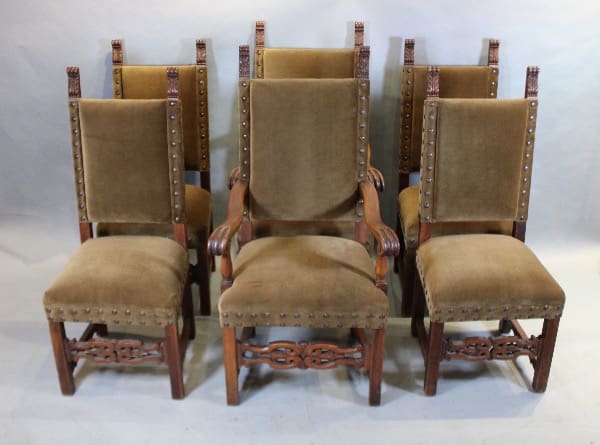Eight brown upholstered chairs in a row.
