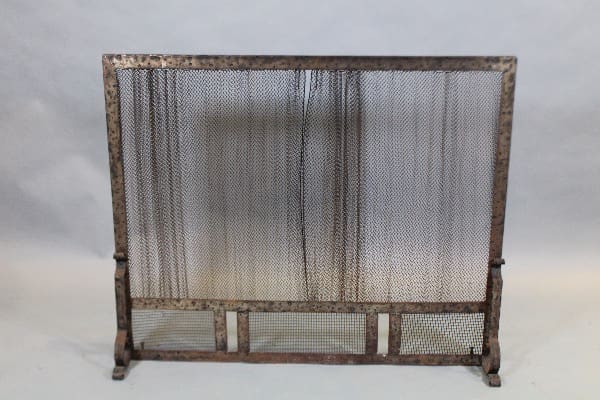 Vintage metal mesh fireplace screen.