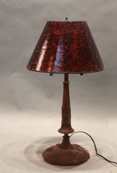 Vintage table lamp with red lampshade.
