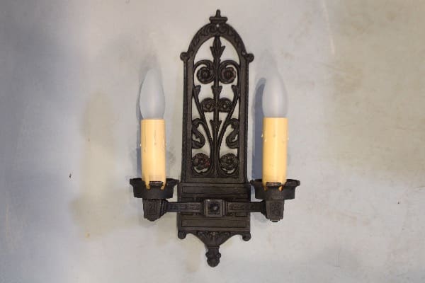 Vintage wrought iron double wall sconce.