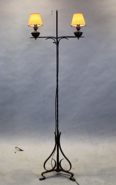 Vintage floor lamp with dual yellow shades.