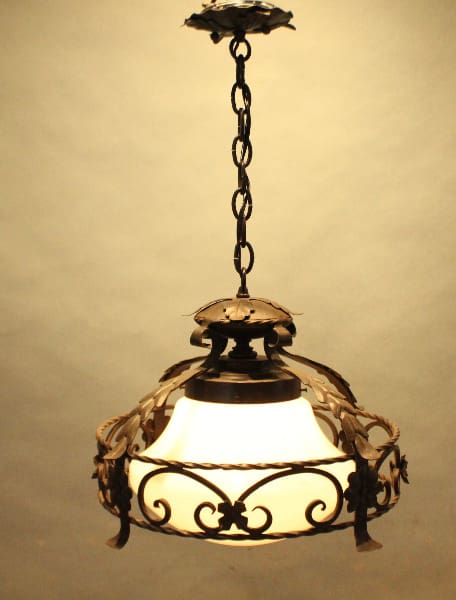 Ornate vintage chandelier with metal design.
