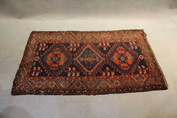 Colorful Persian rug with geometric patterns.