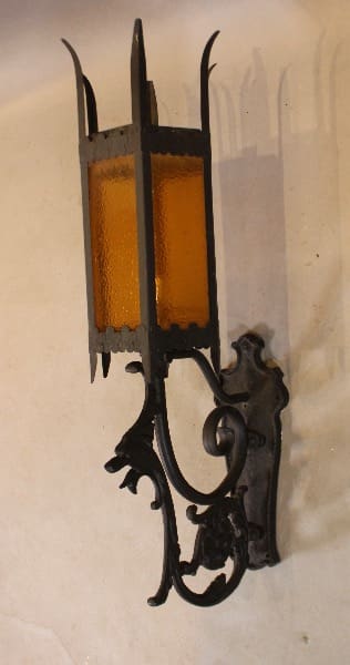 Vintage wrought iron wall sconce lamp.