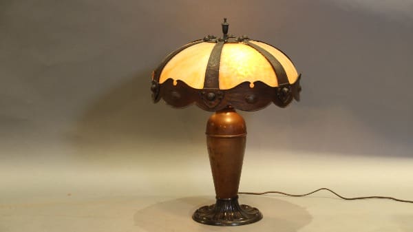 Vintage table lamp with ornate stained glass.