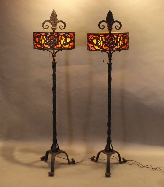 Two ornate floor lamps with intricate designs.