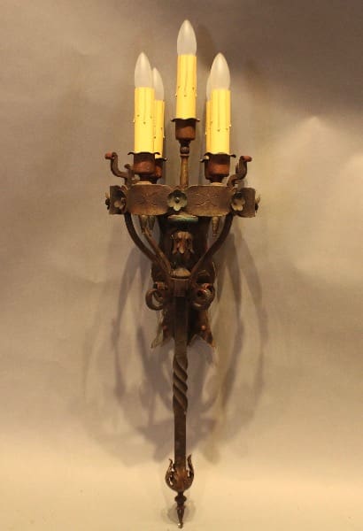 Vintage wall sconce with candle bulbs.