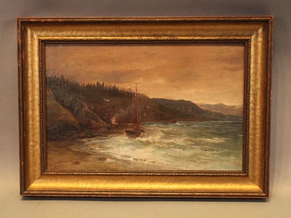 Framed seascape painting with boat and cliffs.