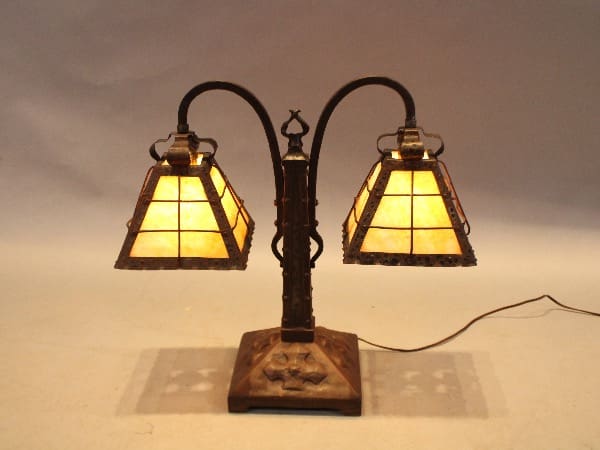 Vintage double lamp with glowing stained glass.