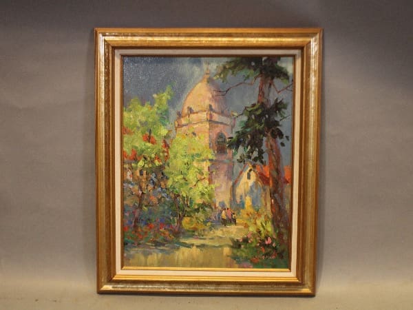 Framed painting of a dome and trees.