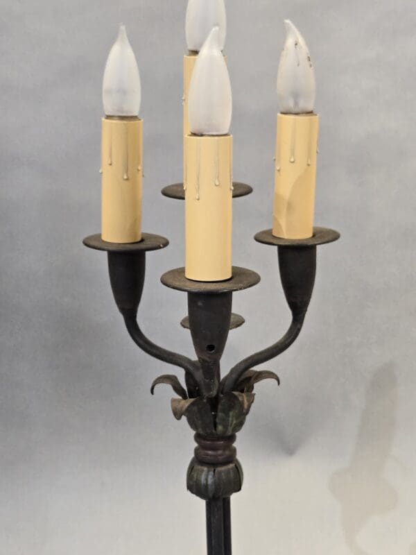 Vintage four-arm candle-style lamp.