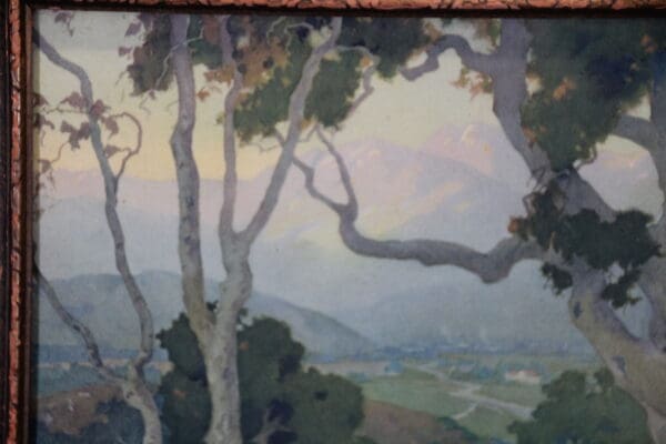 Landscape painting with trees and distant mountains.