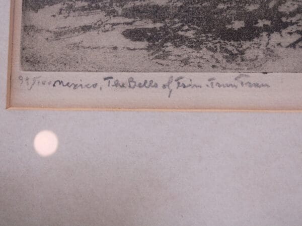 Handwritten text below a vintage photograph.