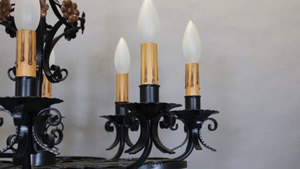 Vintage chandelier with candle-shaped bulbs.