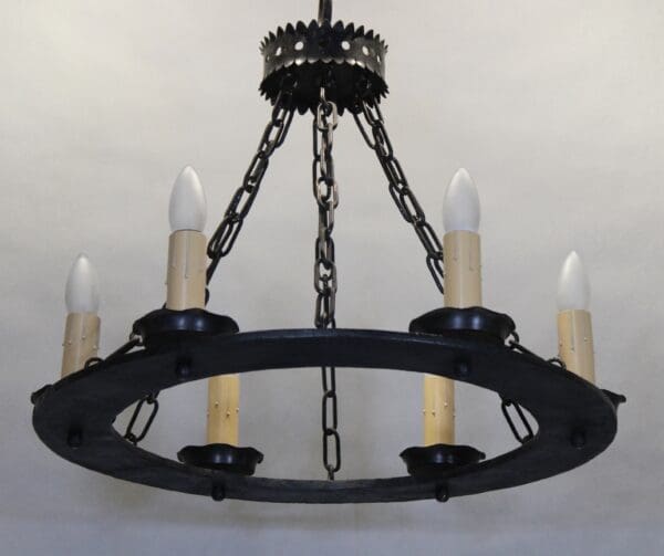 Rustic chandelier with candle-shaped bulbs.