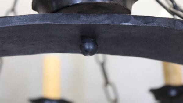 Close-up of a black metal chandelier.