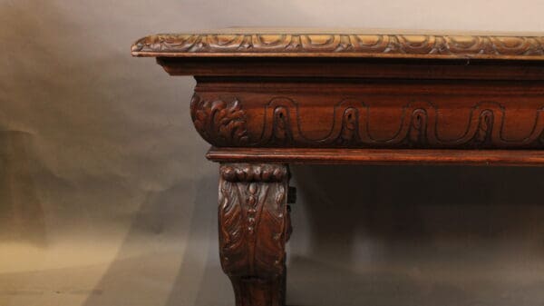 Ornate wooden table with carved details.