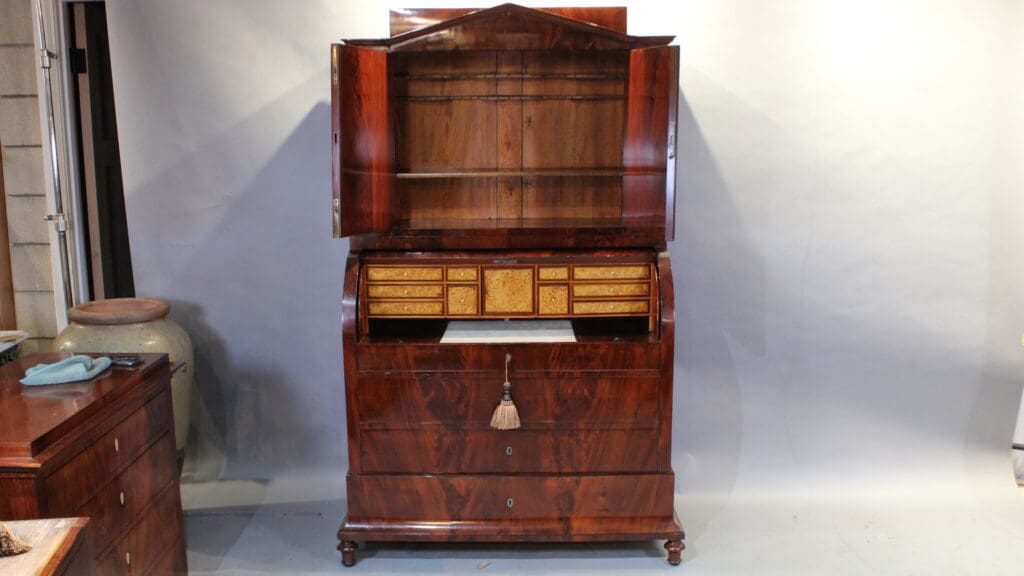 Antique wooden cabinet with open compartments.
