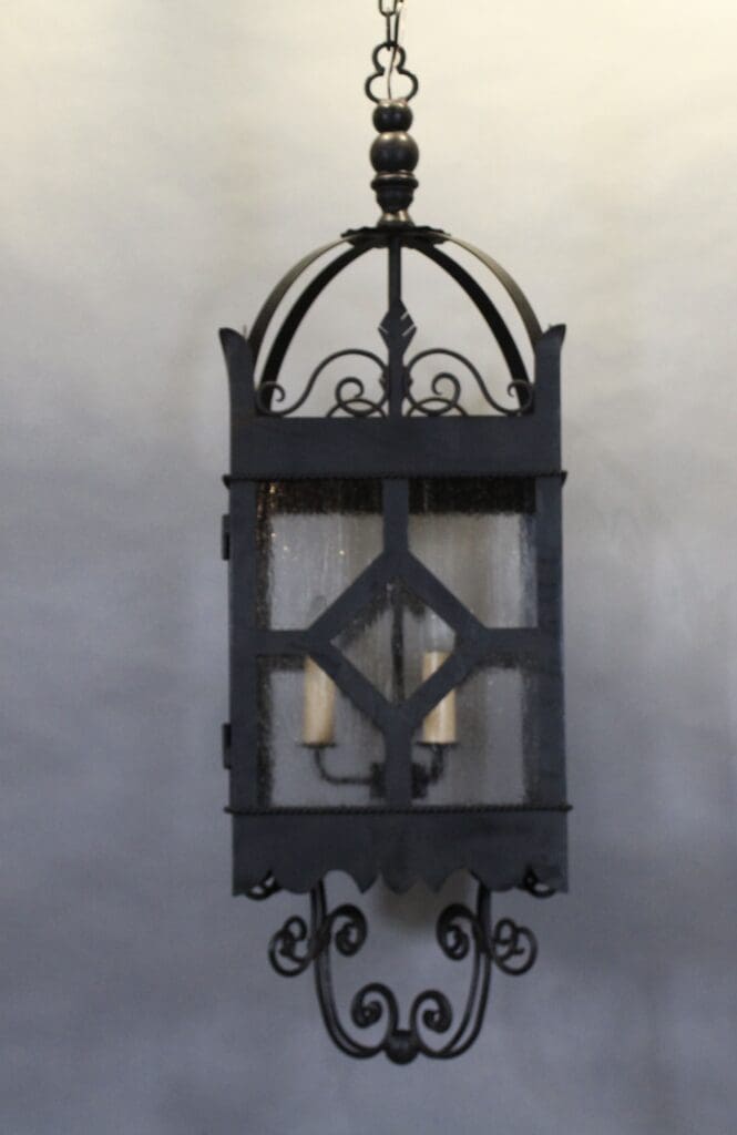 Ornate black vintage hanging lantern fixture.