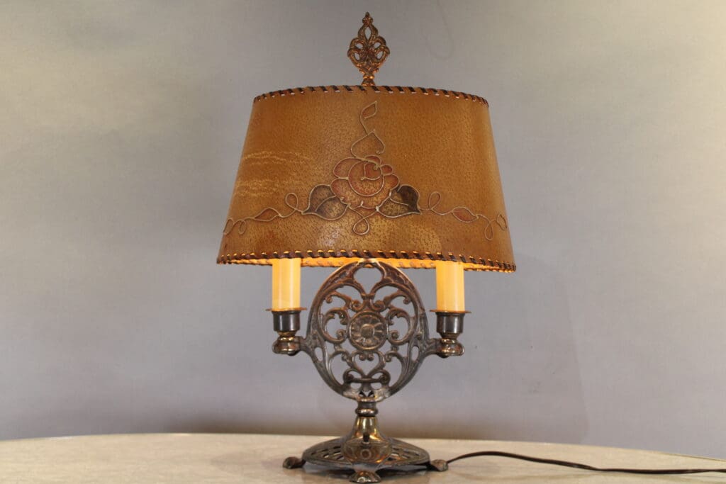Ornate table lamp with decorative lampshade.