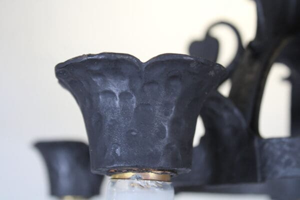 Close-up of black metal candle holder.