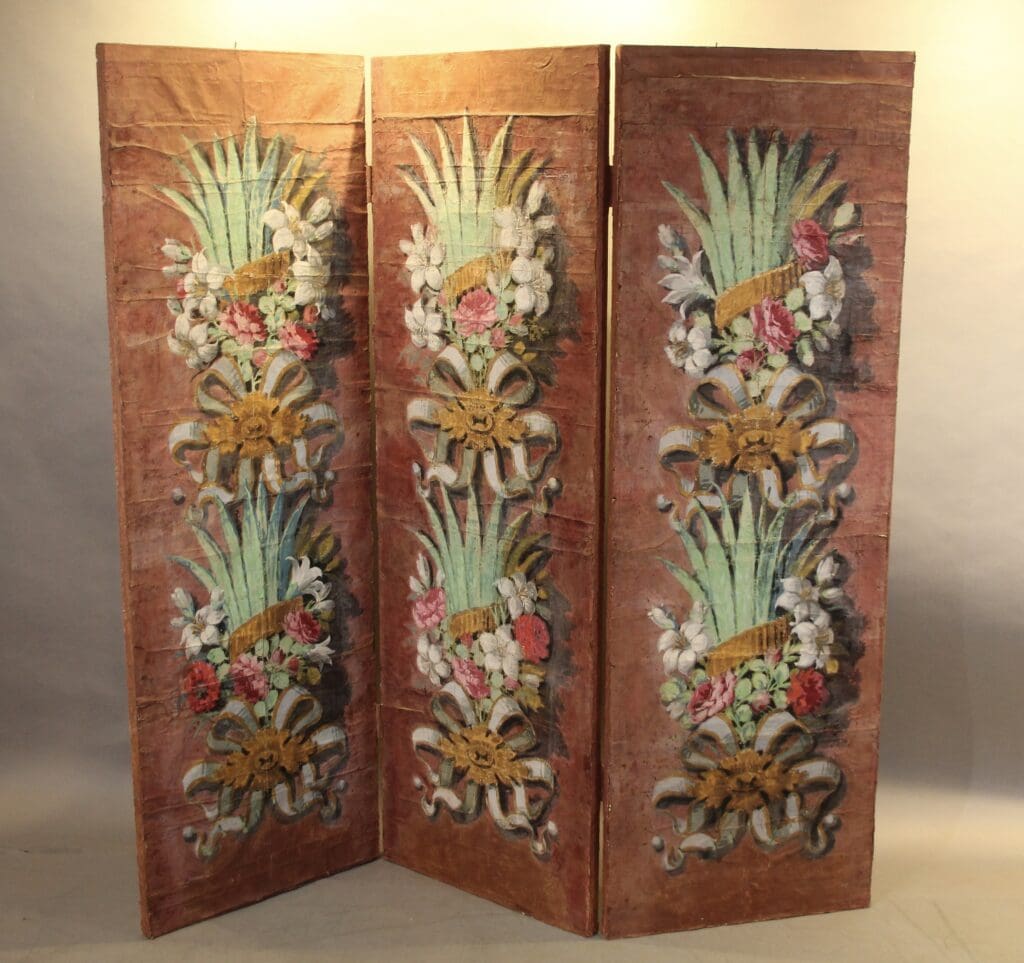 Decorative folding screen with floral patterns.