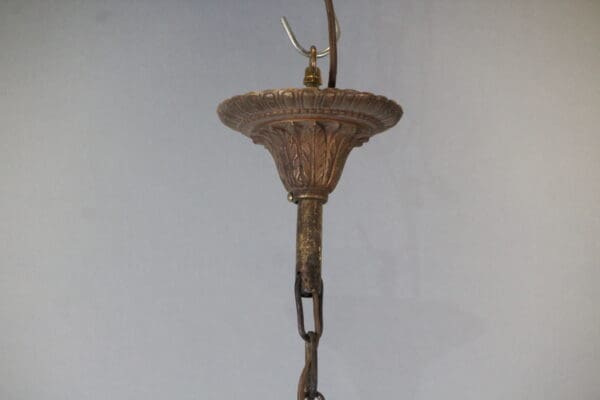 Antique hanging lamp fixture with chain.