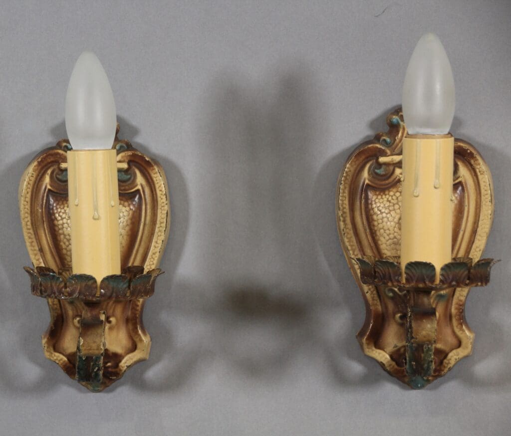 Vintage wall sconces with candle bulbs.