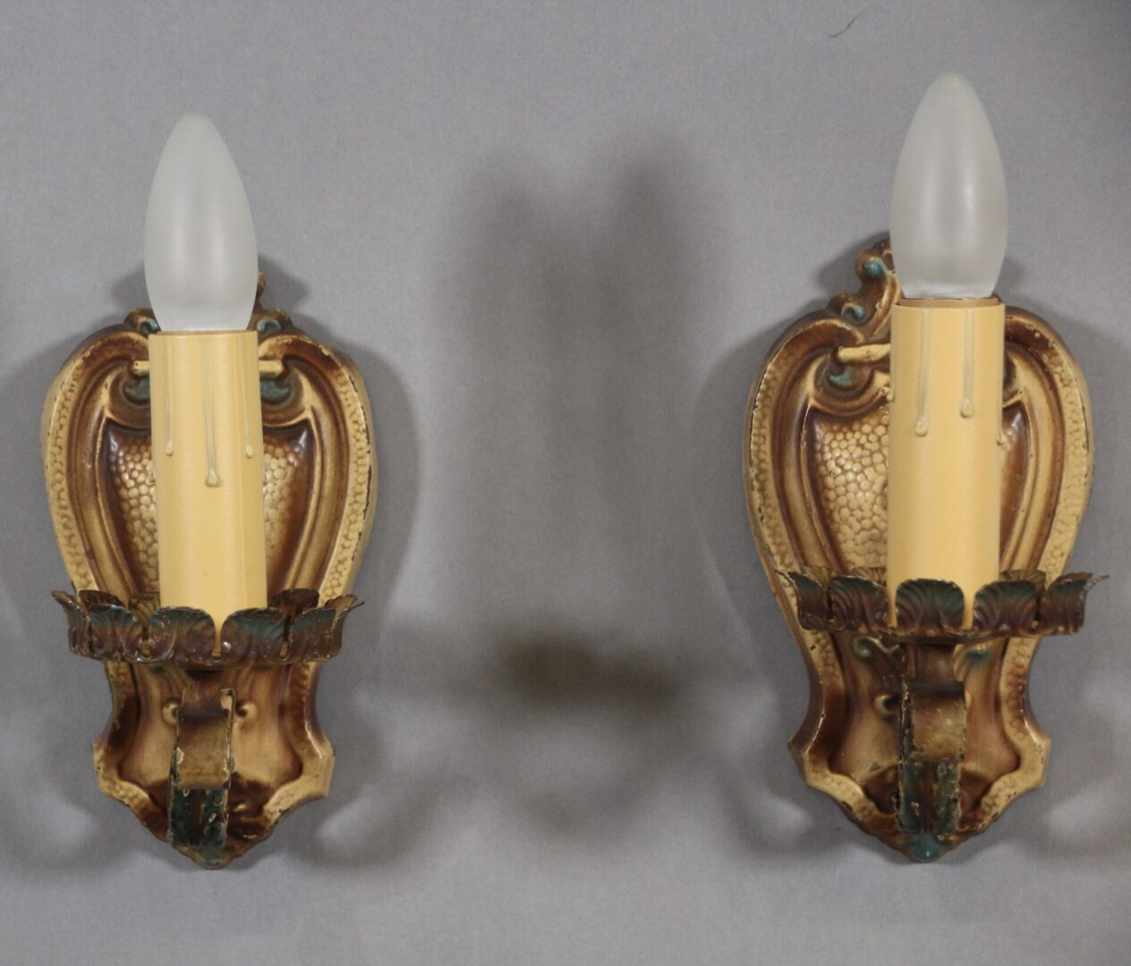 Vintage wall sconces with candle bulbs.