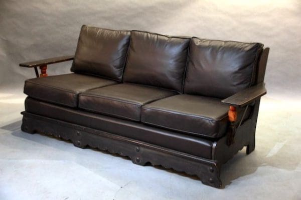 39882. Signed Monterey Sofa With Metal Straps And Leather Upholstery