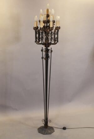 Antique wrought iron floor lamp.